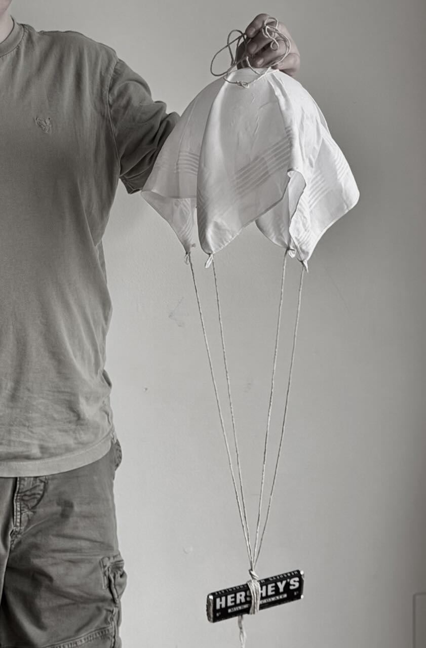 Finished parachute! I glued tissue over a balloon, let it dry, and then popped the balloon to get that perfect dome shape.&nbsp;